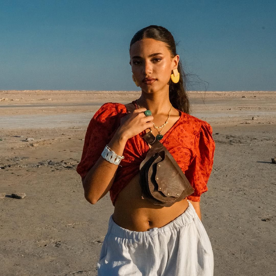 model wearing leahter waist bag